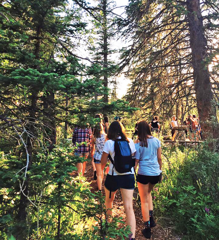 Campers Exploring a River